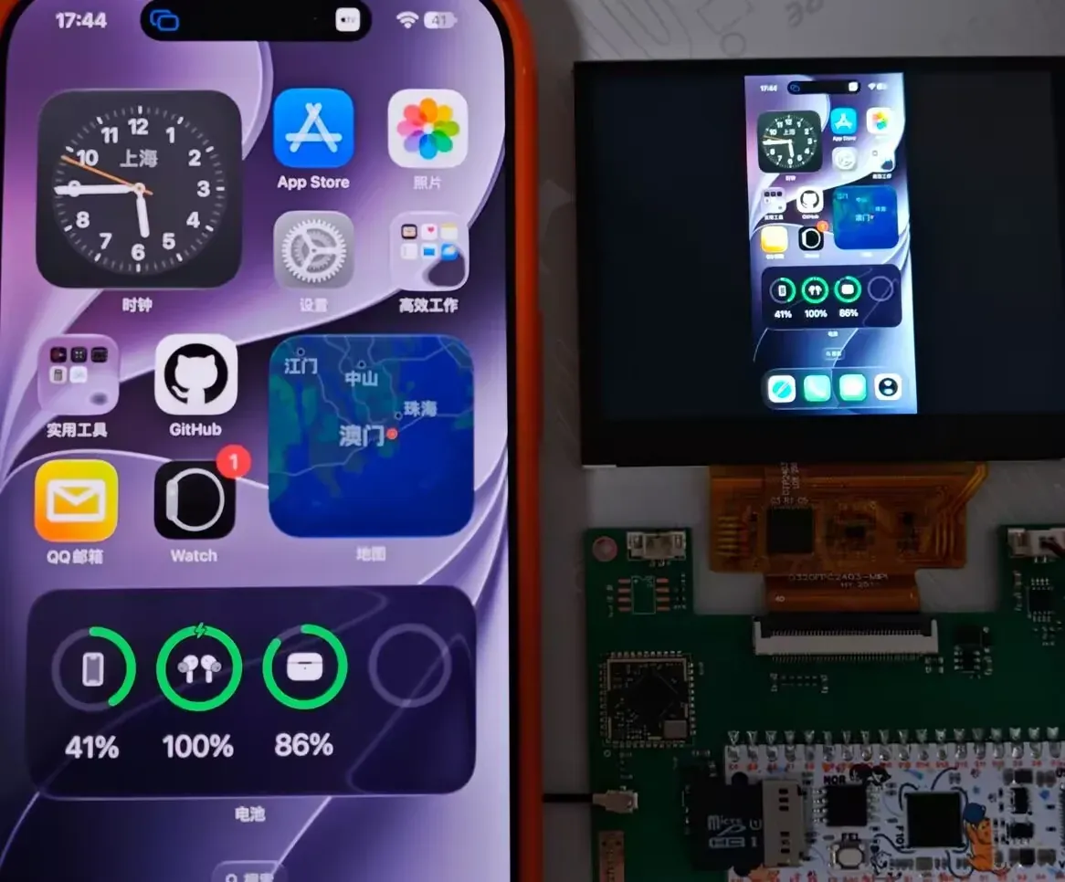 The iPhone screen and the mirrored picture on the board screen side by side