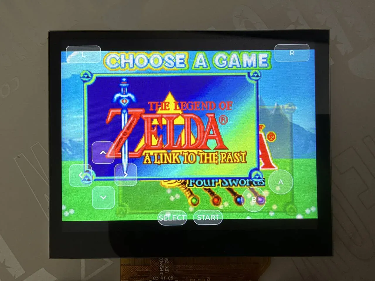 GBA game picture on the board screen with the on-screen buttons overlaid