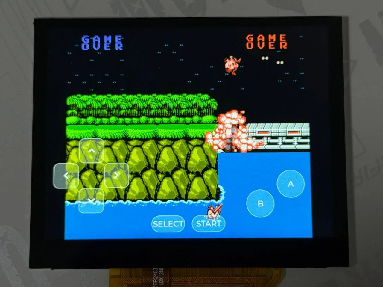 NES game picture on the board screen with the on-screen buttons overlaid